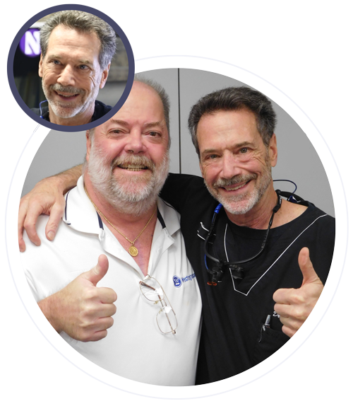 DR Silberg and a man smiling and giving a thumbs up